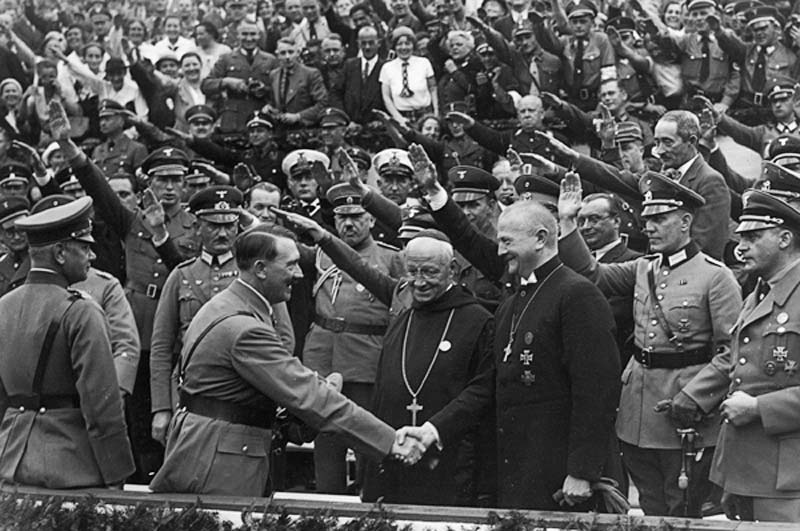 Lutheran Bishop Ludwig Muller, leader of the Reich Church in Germany, greets Hitler